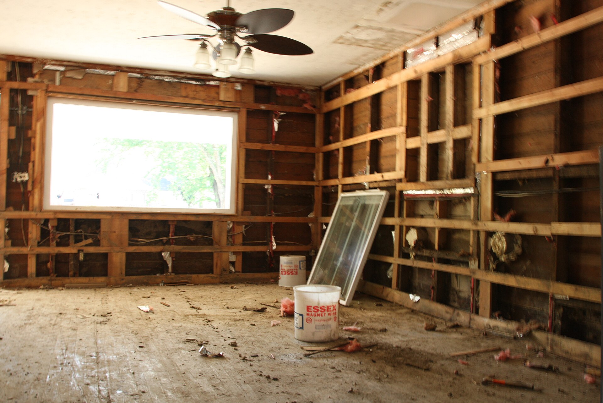 Gutted room. Studs open, insulation pulled. Temporary still.